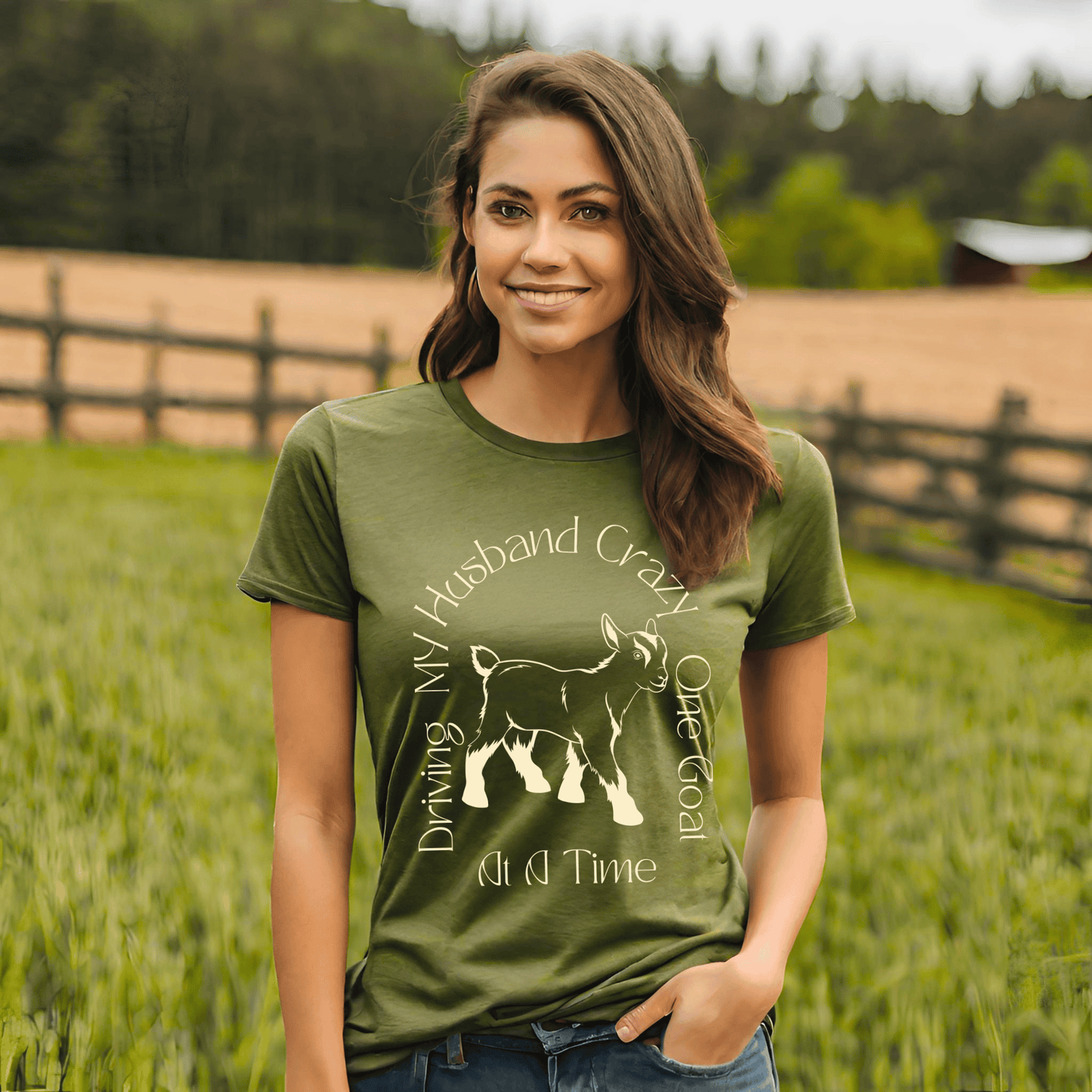 The saying Driving My Husband Crazy One Goat At A Time. with a cute outline of a baby goat on a crew neck t-shirt