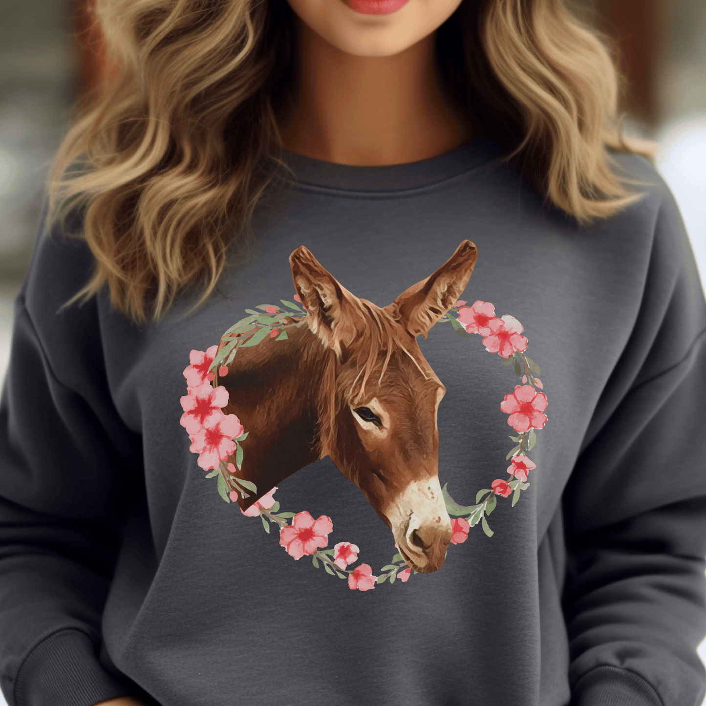Crew neck sweatshirt with a cute donkey surrounded by a pink flower wreath.