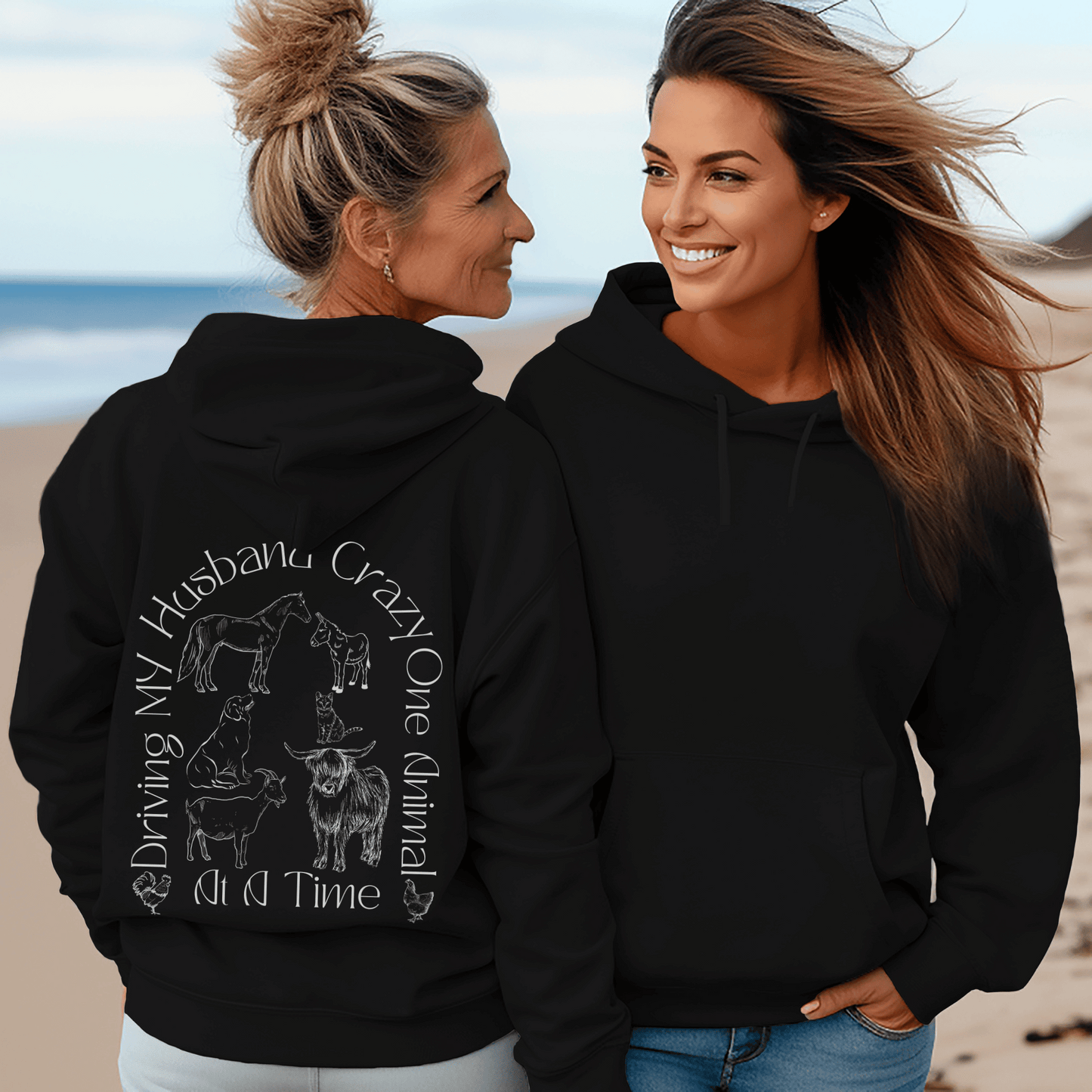 Hoodie with the saying Driving My Husband Crazy one Animal at a time on the back with a silhouette of a horse, donkey, dog , cat, goat, cow and chickens, same design on the front but smaller.
