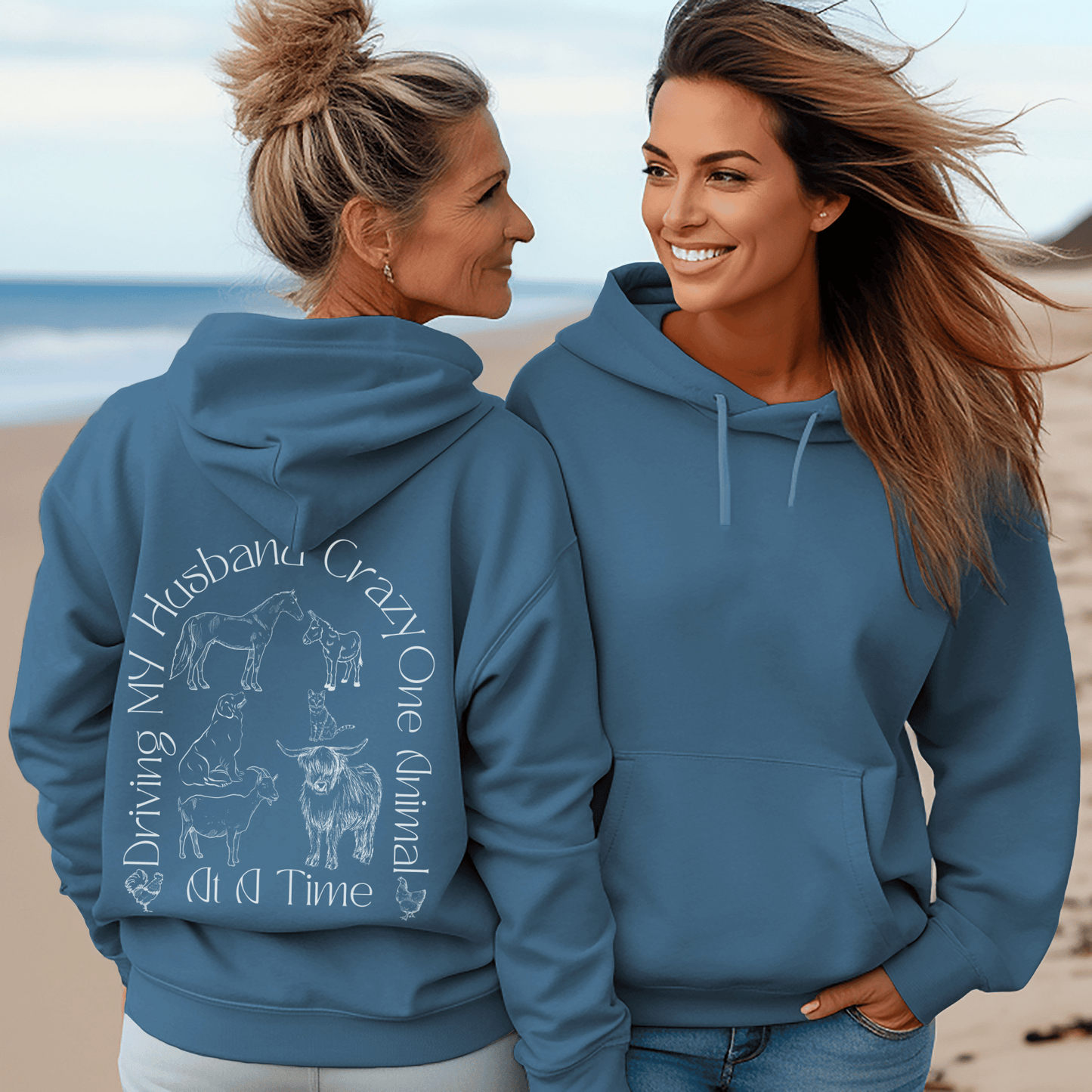 Hoodie with the saying Driving My Husband Crazy one Animal at a time on the back with a silhouette of a horse, donkey, dog , cat, goat, cow and chickens, same design on the front but smaller.