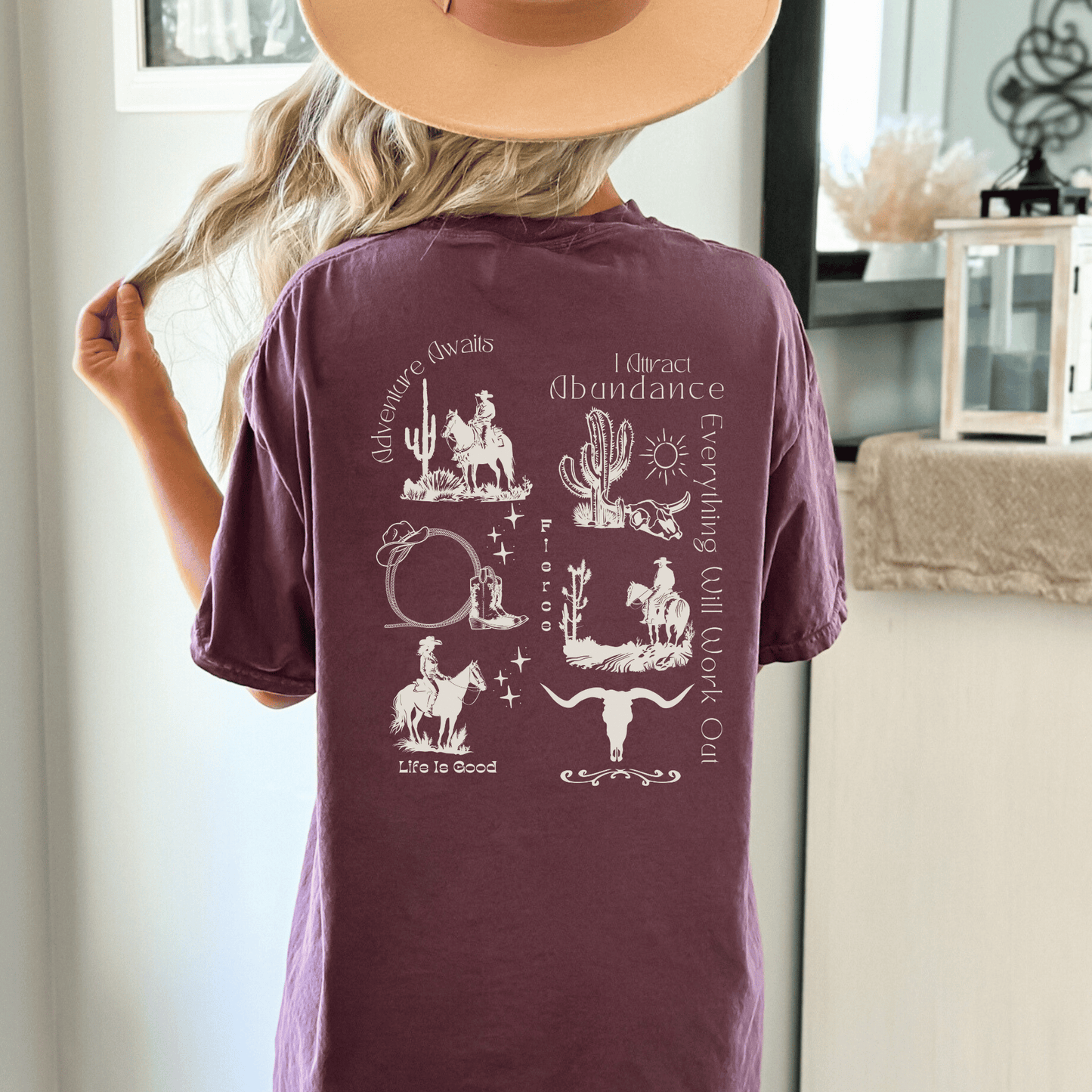 a trendy western design on the back of a comfort colors tee! If you're a true lover of all things western, this is the perfect addition to your wardrobe. Our skilled artisans have carefully crafted a unique design that beautifully captures the essence of the Wild West.