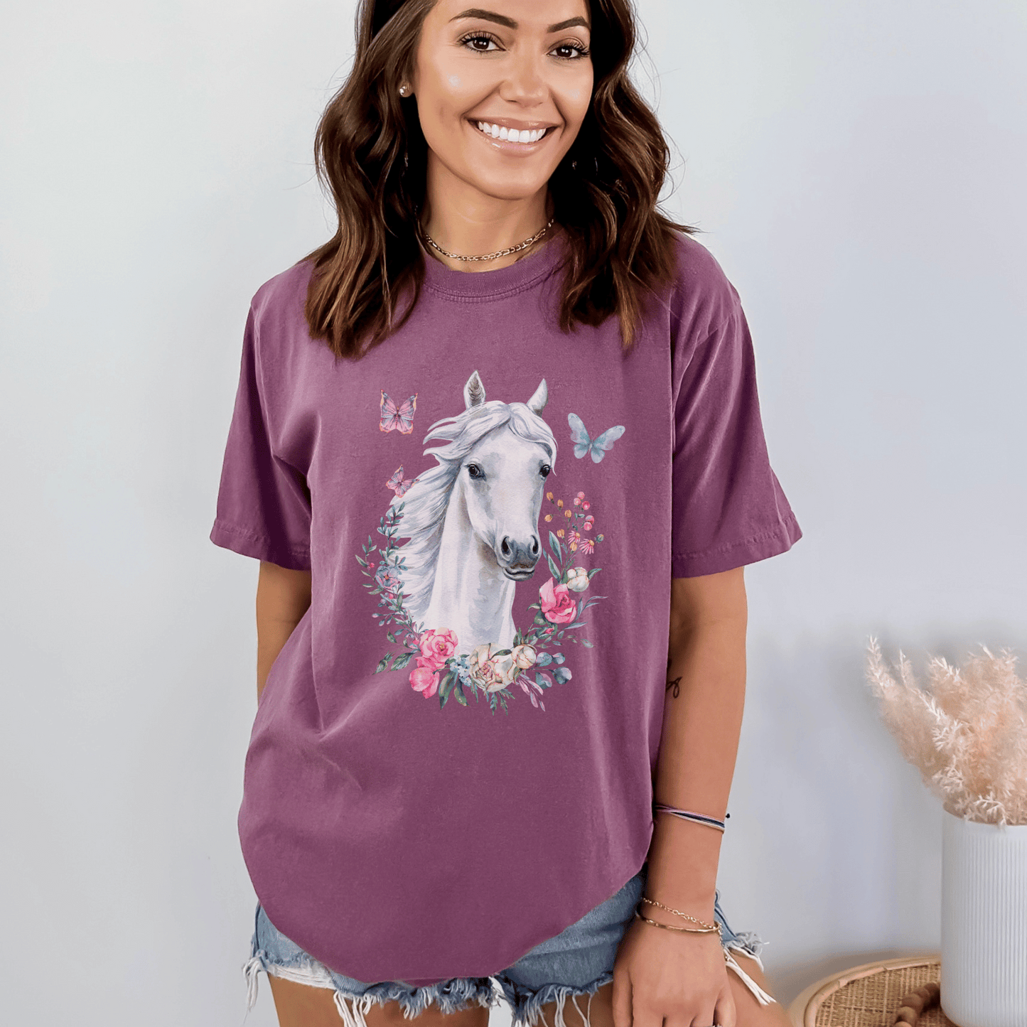 White Horse Boho Cowgirl t-shirt with a stunning cottagecore design featuring floral and butterflies in pastel colors. Made with high-quality materials, this shirt is both stylish and comfortable, perfect for any occasion. Whether you're dressing up for a night out or keeping it casual, this t-shirt is sure to turn heads