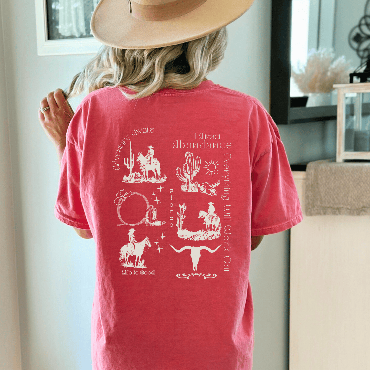 a trendy western design on the back of a comfort colors tee! If you're a true lover of all things western, this is the perfect addition to your wardrobe. Our skilled artisans have carefully crafted a unique design that beautifully captures the essence of the Wild West.