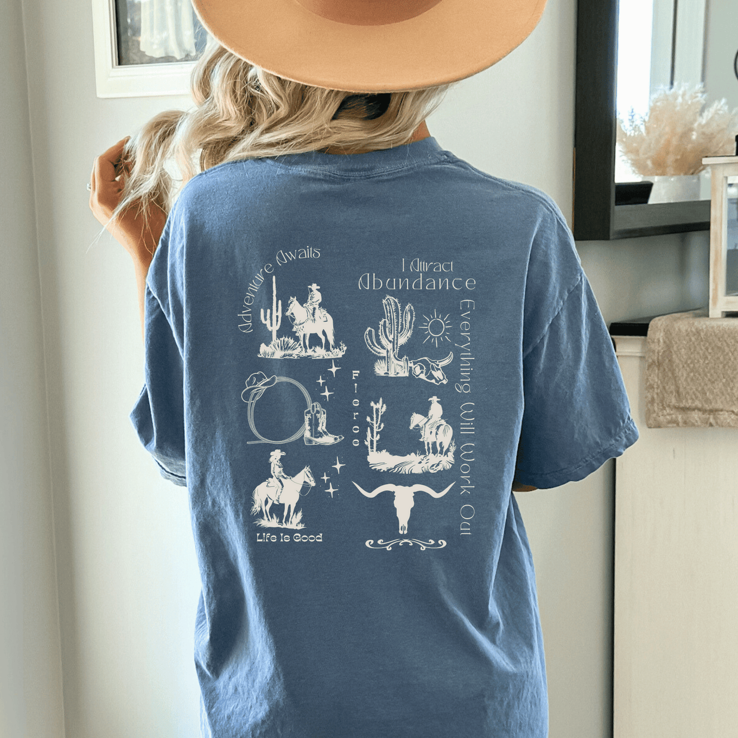 a trendy western design on the back of a comfort colors tee! If you're a true lover of all things western, this is the perfect addition to your wardrobe. Our skilled artisans have carefully crafted a unique design that beautifully captures the essence of the Wild West.