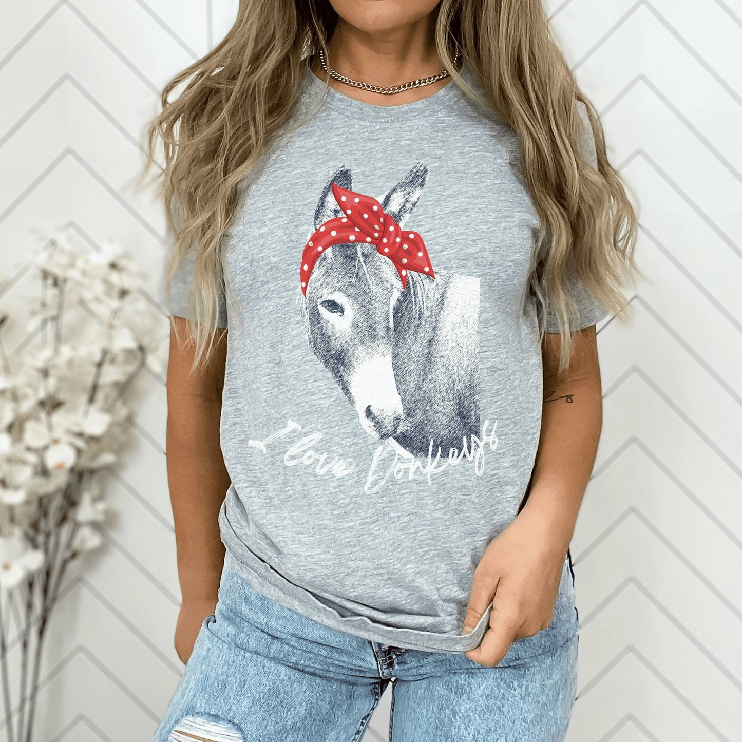I Love Donkeys Shirt, the perfect gift for any donkey lover! Embrace your passion for these gentle creatures with our charming women's country life t-shirt. Crafted with soft and breathable fabric, this graphic tee guarantees comfort and style that will make you stand out.