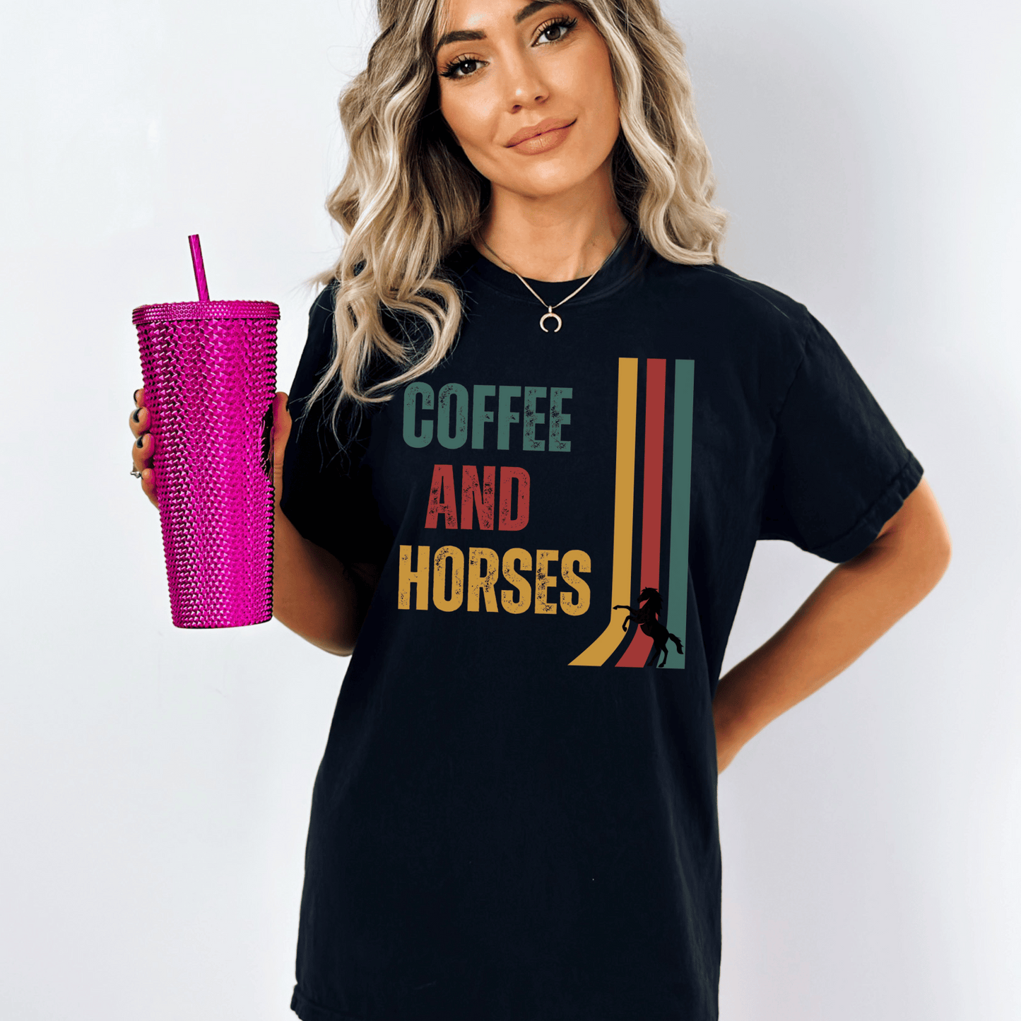 Graphic tee with the saying Coffee and Horses in a vintage font printed on a comfort colors tee.