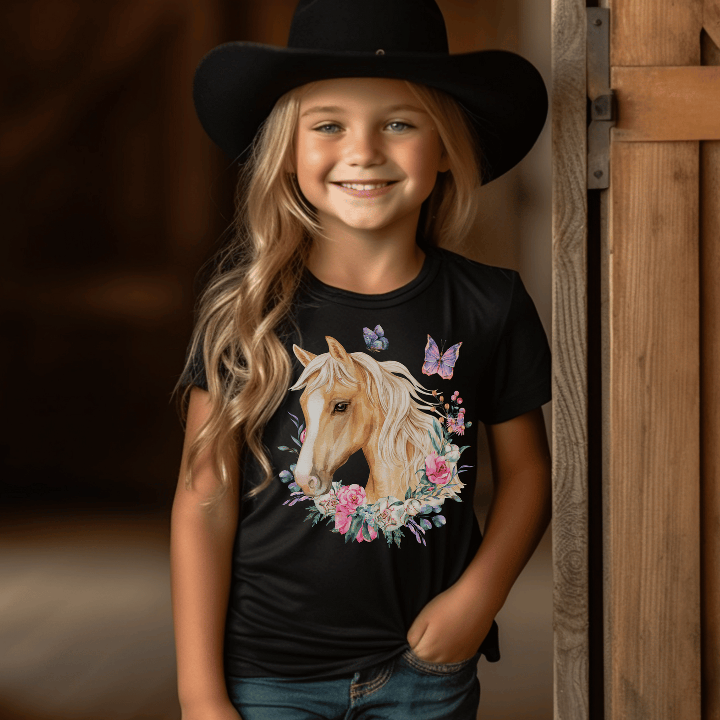 charming Youth T-Shirt adorned with a breathtaking Palomino horse, delicate floral motifs, and enchanting butterfly design. This fashion-forward tee will make your little one feel as graceful as a butterfly and as elegant as a Palomino horse.