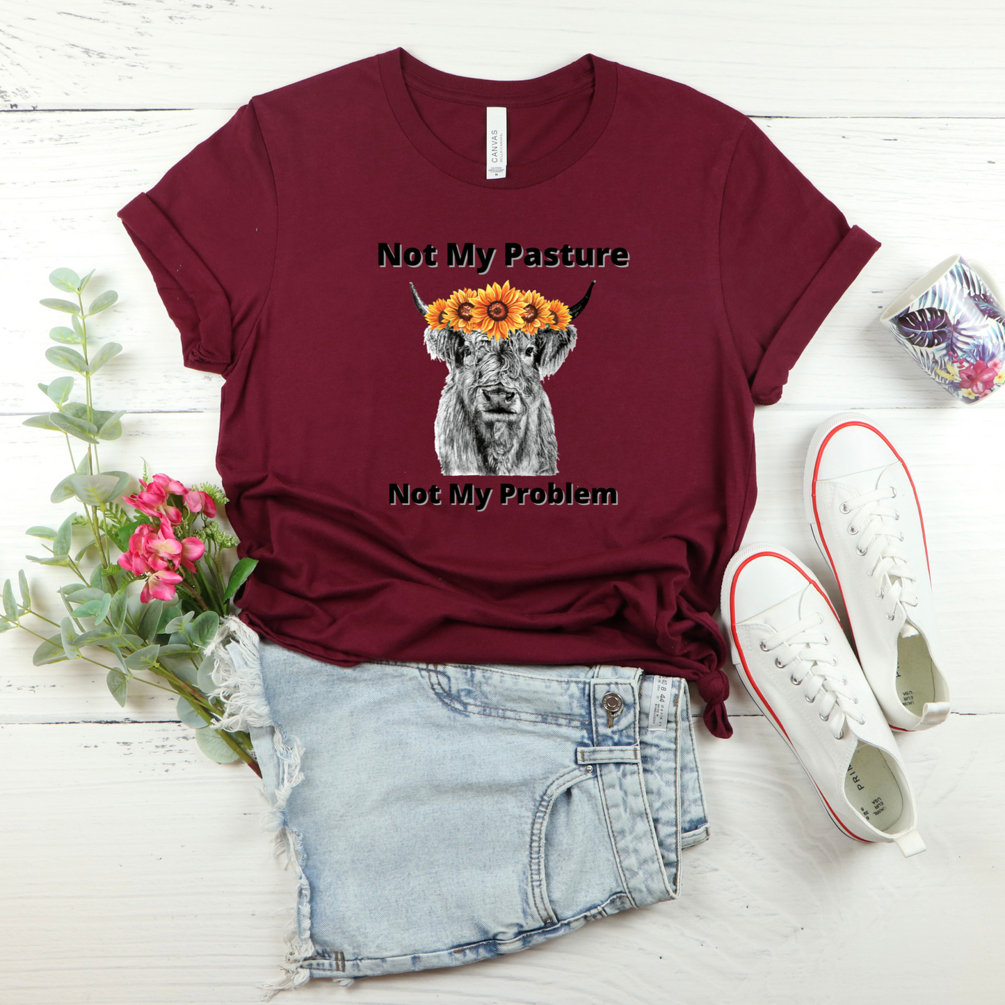 Not my pasture, not my problem highland cow on a maroont-shirt