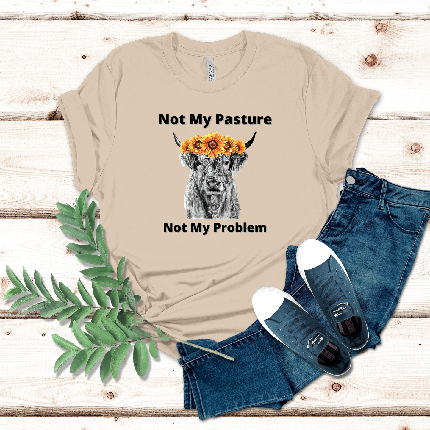 Not my pasture, not my problem highland cow on a soft cream t-shirt