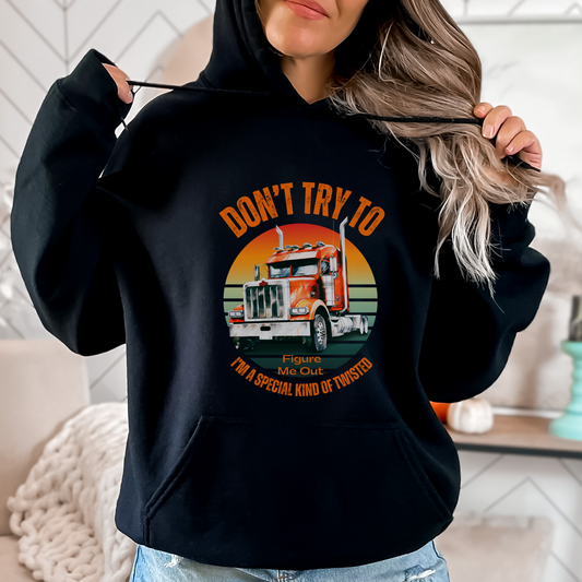 Hoodie with  a  semi with a vintage font in orange that says Don't try to figure me out, I'm a special kind of twisted on the fron of the sweatshirt.