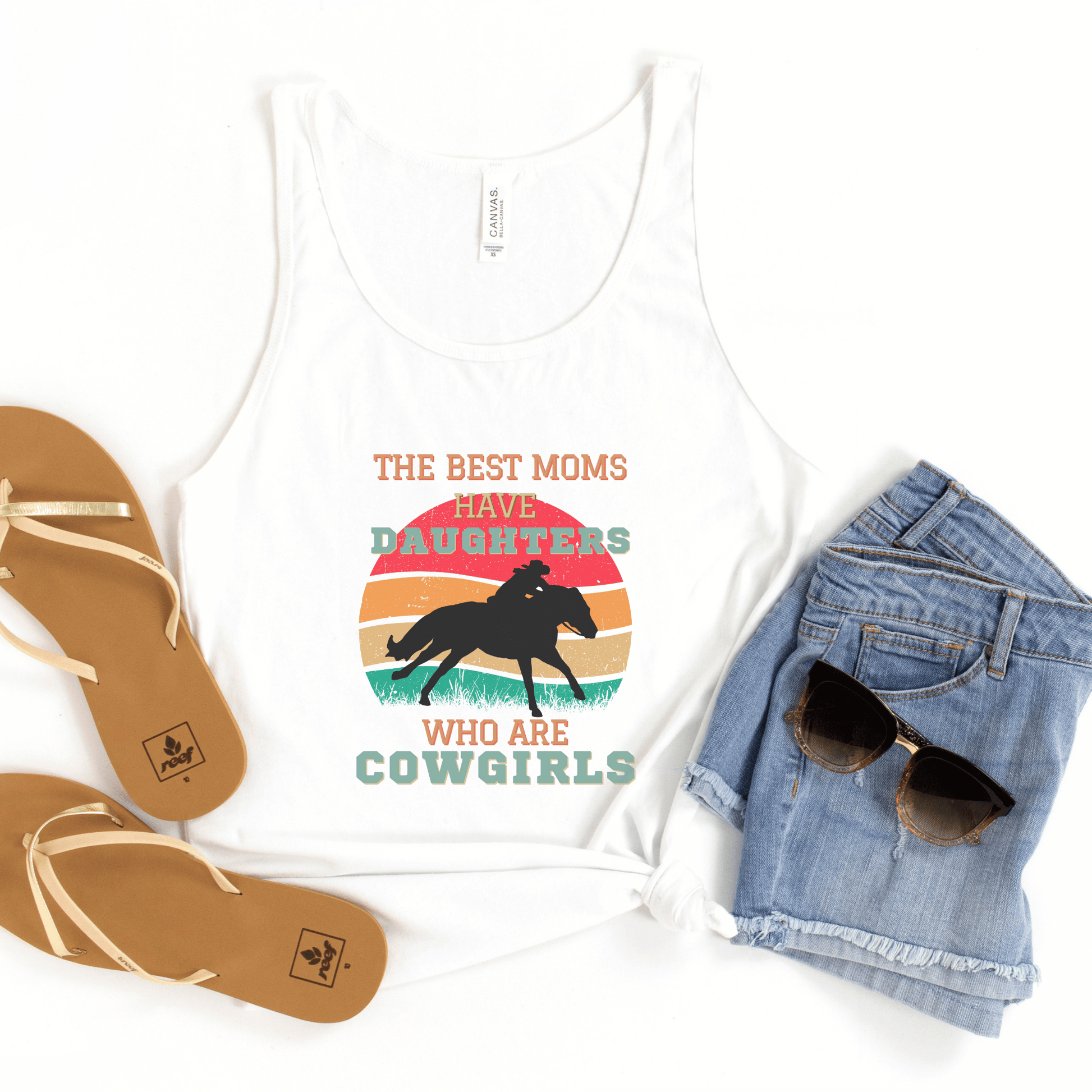 This Tank Top is perfect for proud Moms of cowgirls and horse lovers. It features the phrase "The Best Moms Have Daughters Who Are Cowgirls," and is made from comfortable and durable materials.