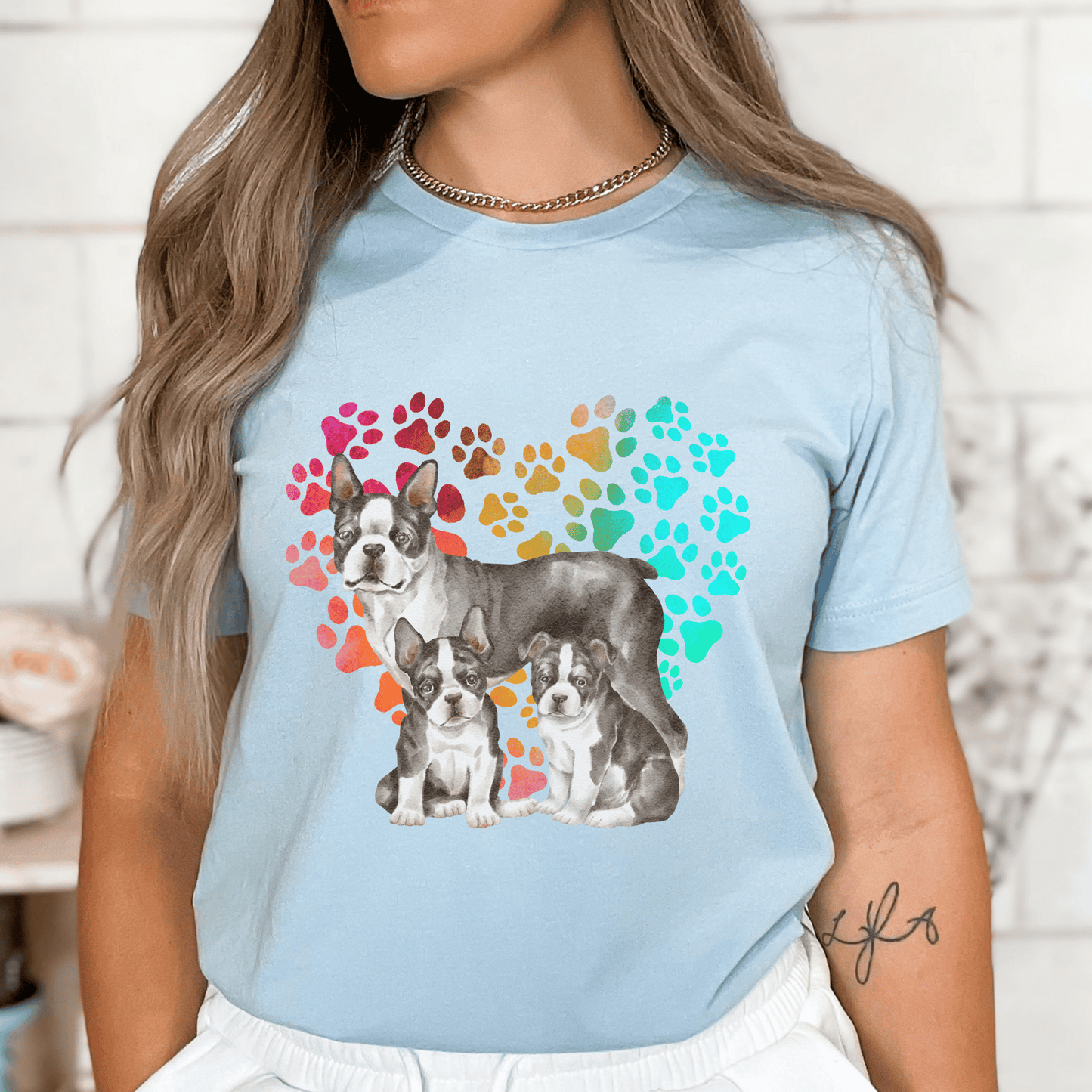 This Boston Terrier t-shirt features a paw print heart in the background, making it a unique and thoughtful gift for dog lovers, pet owners, and Boston Terrier moms. The shirt is perfect for anyone who wants to show off their love for their furry friend.