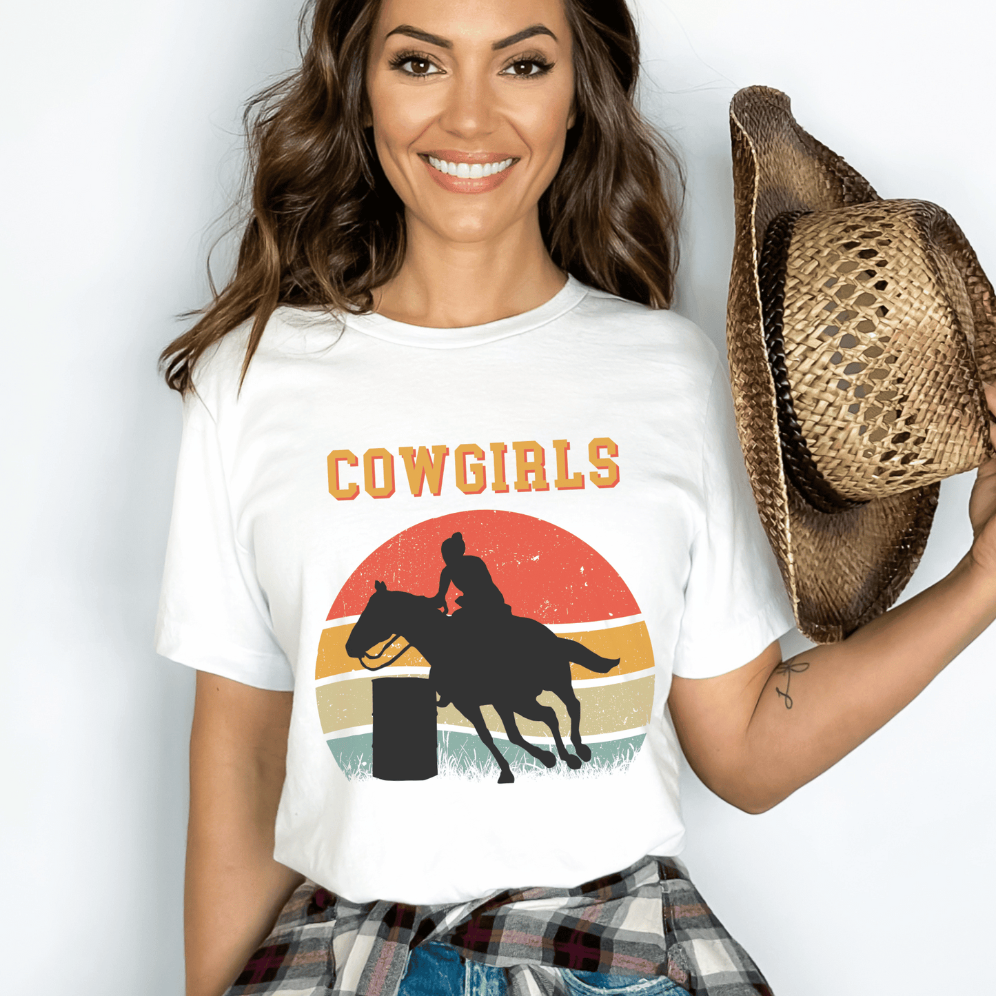 This exceptional piece features a captivating illustration of a lady fearlessly racing through barrels, showcasing her true cowgirl spirit. With the word cowgirls elegantly displayed above the scene, this artwork perfectly encapsulates the fierce and determined energy of these empowered women. Whether you're a fan of rodeos, Western culture, or simply appreciate unique vintage design