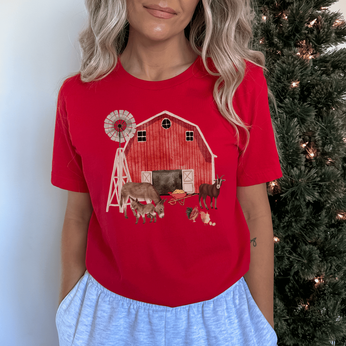 This cute farm shirt is great for anyone that loves the country and animals. The design features adorable farm animals and a red barn. This shirt is perfect gift for anyone who loves the outdoors and farms. Makes a great gift for animal lovers farmers, ranchers, and anyone in the countryside.