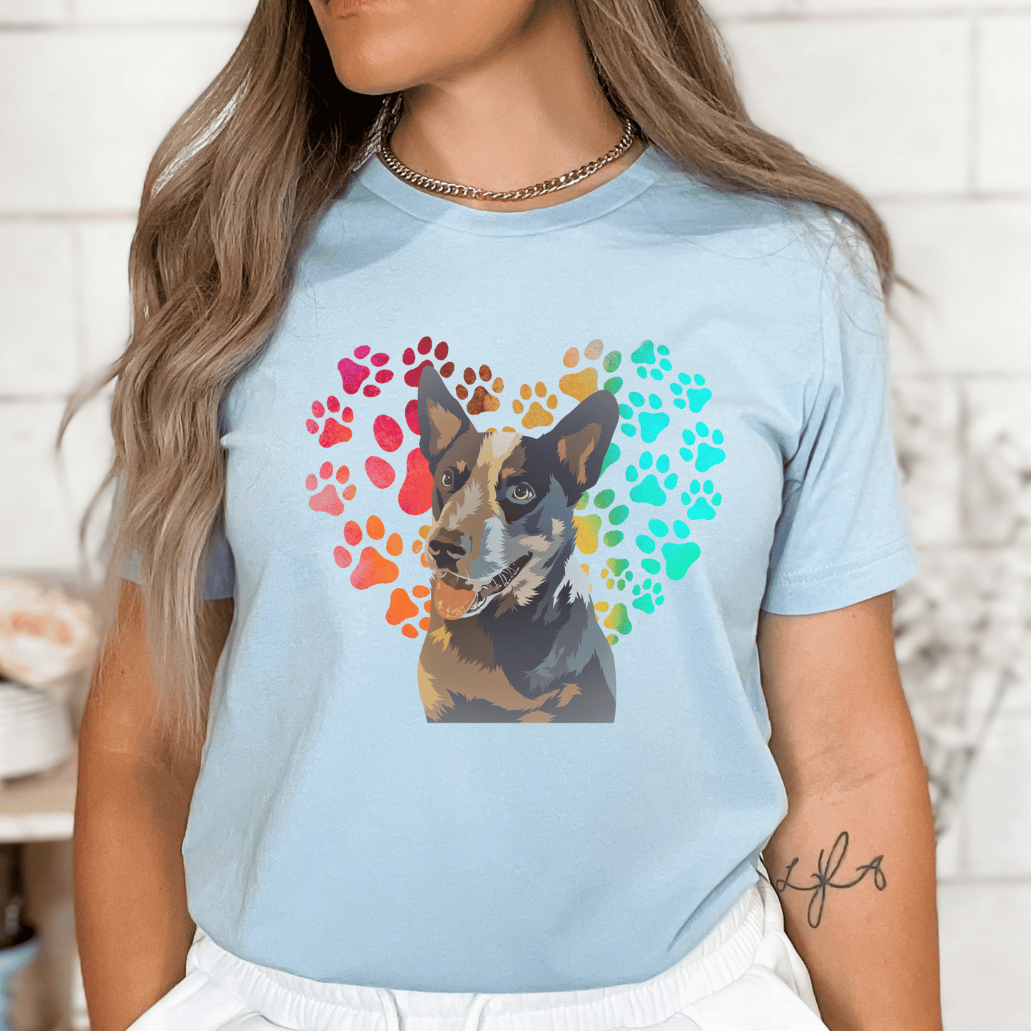 This Blue Heeler t-shirt features a paw print heart in the background, making it a unique and thoughtful gift for dog lovers, pet owners, and Blue Heeler. The shirt is perfect for anyone who wants to show off their love for their furry friend.