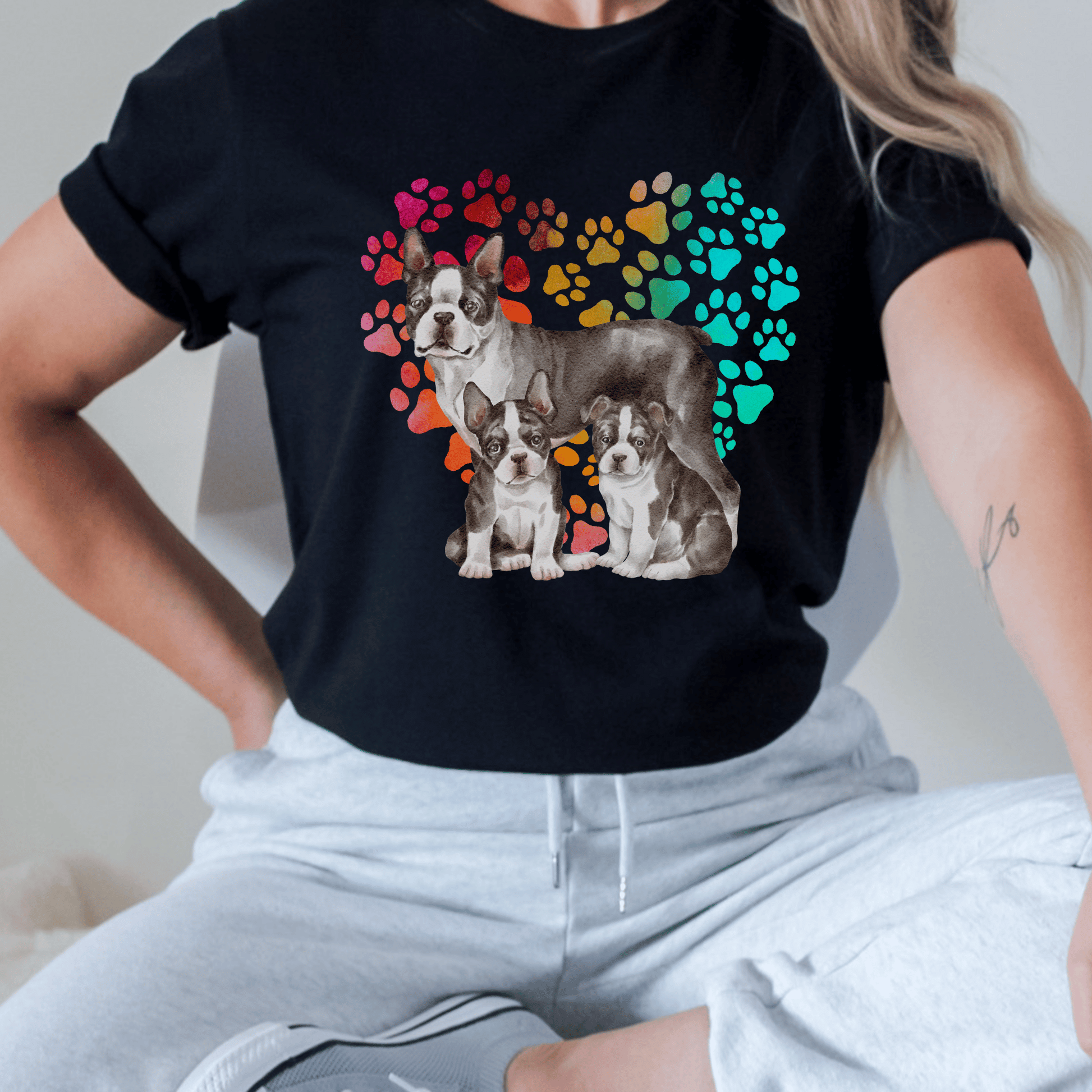 This Boston Terrier t-shirt features a paw print heart in the background, making it a unique and thoughtful gift for dog lovers, pet owners, and Boston Terrier moms. The shirt is perfect for anyone who wants to show off their love for their furry friend.