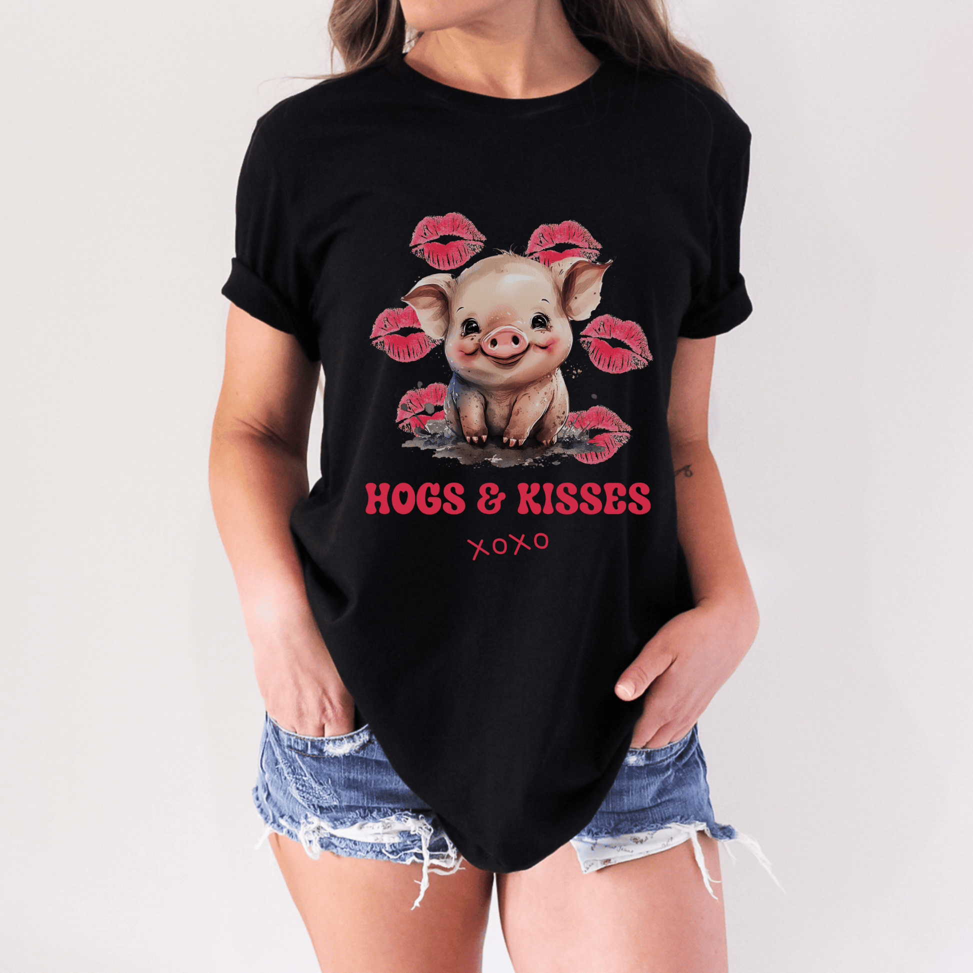 Look no further than this cute pig t-shirt that says "Hogs and Kisses". Whether you're a pig lover or just want to make a playful statement, this t-shirt is the perfect choice. Crafted from top-quality material, this shirt is both durable and comfortable, making it perfect for any occasion. So go ahead and add some fun to your wardrobe with this fun and flirty pig t-shirt.