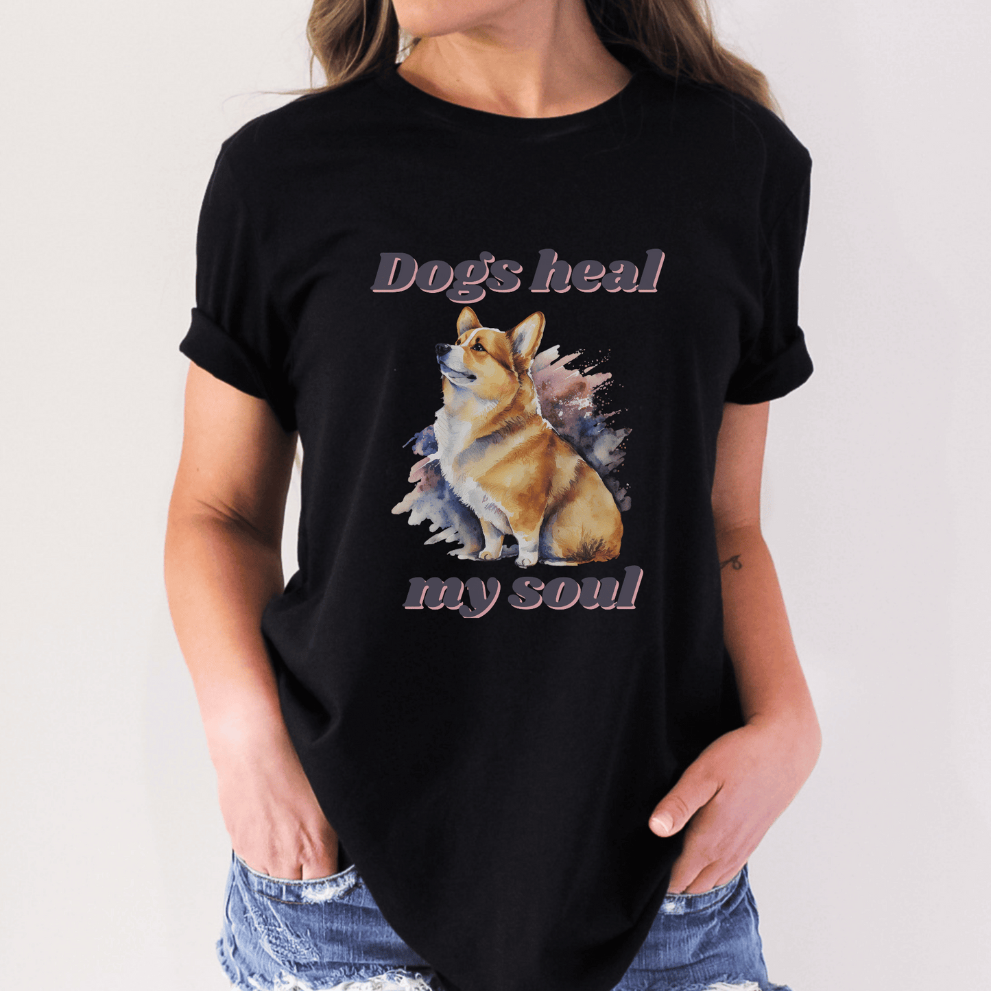 The "Dogs Heal My Soul" t-shirt features a cute corgi dog design, making it a perfect gift for any dog Momma who loves corgis. It is a unique and thoughtful gift that is sure to be appreciated.