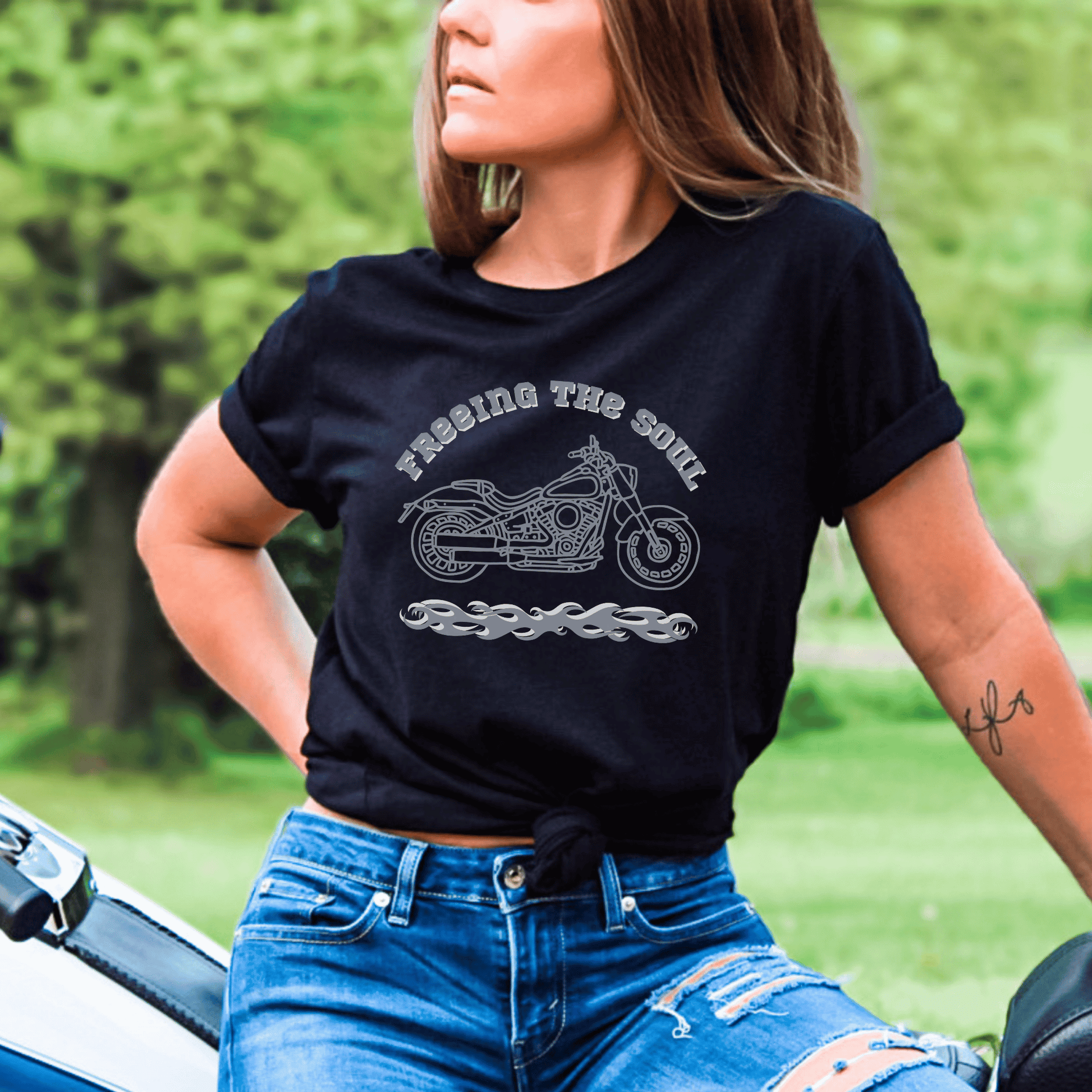 "Freeing the Soul" tee, designed for both men and women who love motorcycle riding! Made with high-quality materials, this tee not only looks great but also provides maximum comfort during long rides